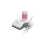 The D7 dental scaler has a pink liquid container and an attached handpiece.