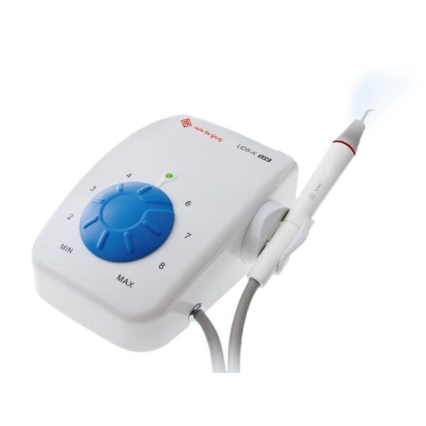 UDS-K LED dental scaler with control knob and handpiece in use.