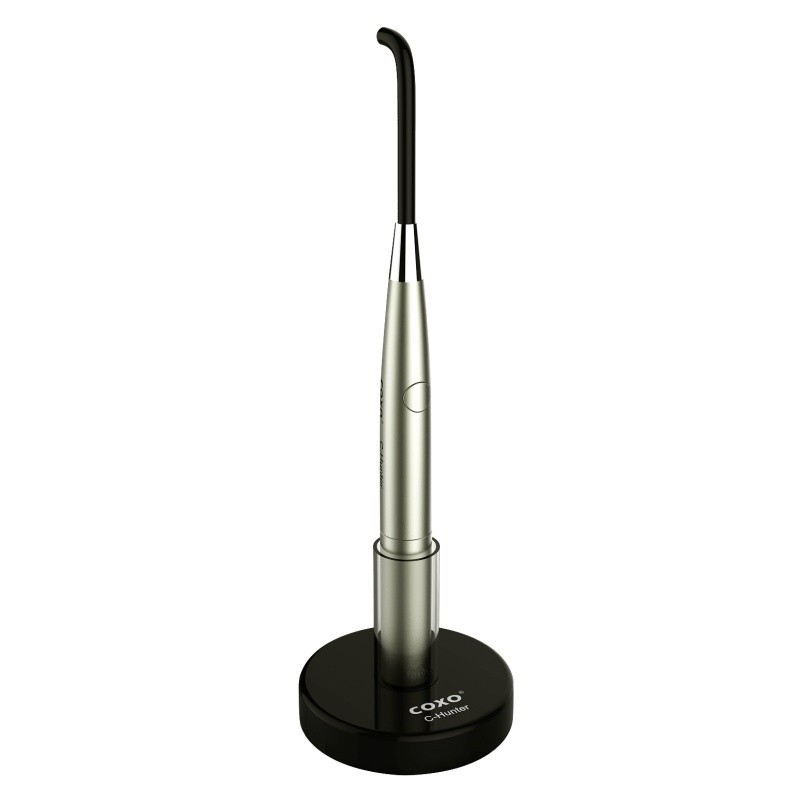 C-HUNTER cordless curing light includes a curved tip and a convenient charging base.