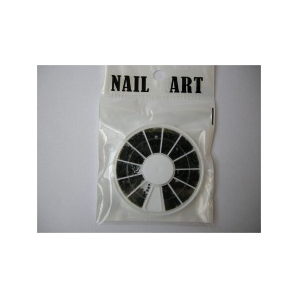 A package labeled BLACK STONE holds a round wheel of small black stone decorations.