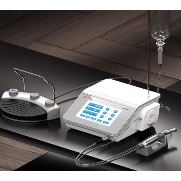 The IMPLANTER WITH LED is a medical device with a touchscreen, foot pedal, and tubing.