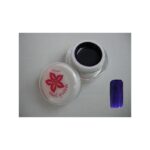 Open MILANO jar with a swatch of dark purple gel beside it.