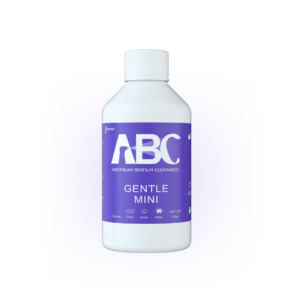 A white bottle labeled PT-S1BICARBONATE PEACH FLAVOR with a purple label and white cap.