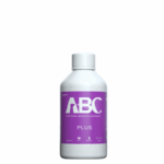 Bottiglia ABC PLUS bianca con etichetta viola di De Giorgi Store, per uso professionale.