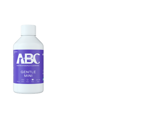 A white bottle labeled ABC Gentle Mini from De Giorgi Store Home on a plain background.